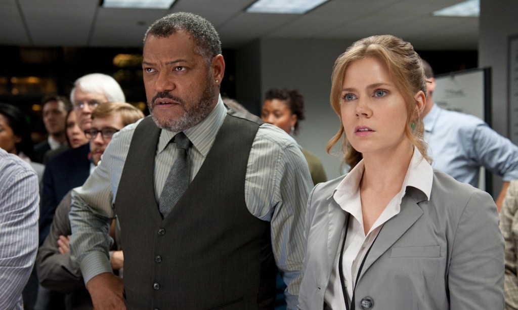 (L-r) LAURENCE FISHBURNE as Perry White and AMY ADAMS as Lois Lane in Warner Bros. Pictures’ and Legendary Pictures’ action adventure “MAN OF STEEL,” a Warner Bros. Pictures release.